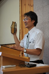 Taka Ashida preaching