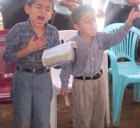 Two Young Boys Lost in Worship