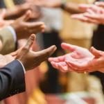 hands open to others